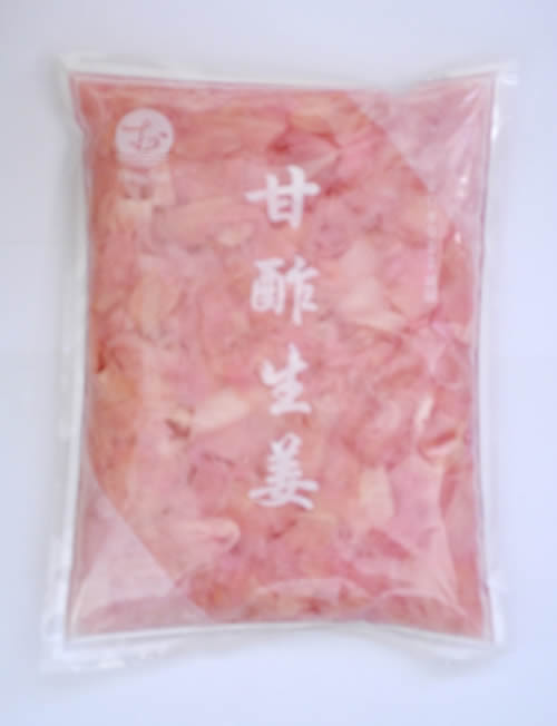 Vertically sliced pink sweet and sour pickled ginger