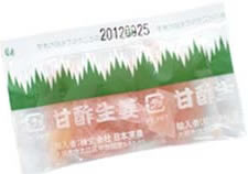 Vertically sliced pink sweet and sour pickled ginger in a small sachet
